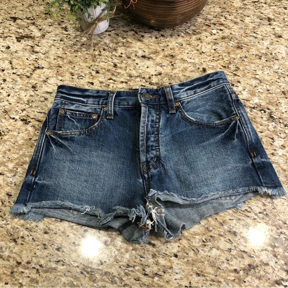 Free People Highwaisted Medium Wash Raw Hem Cutoffs Denim Shorts 24